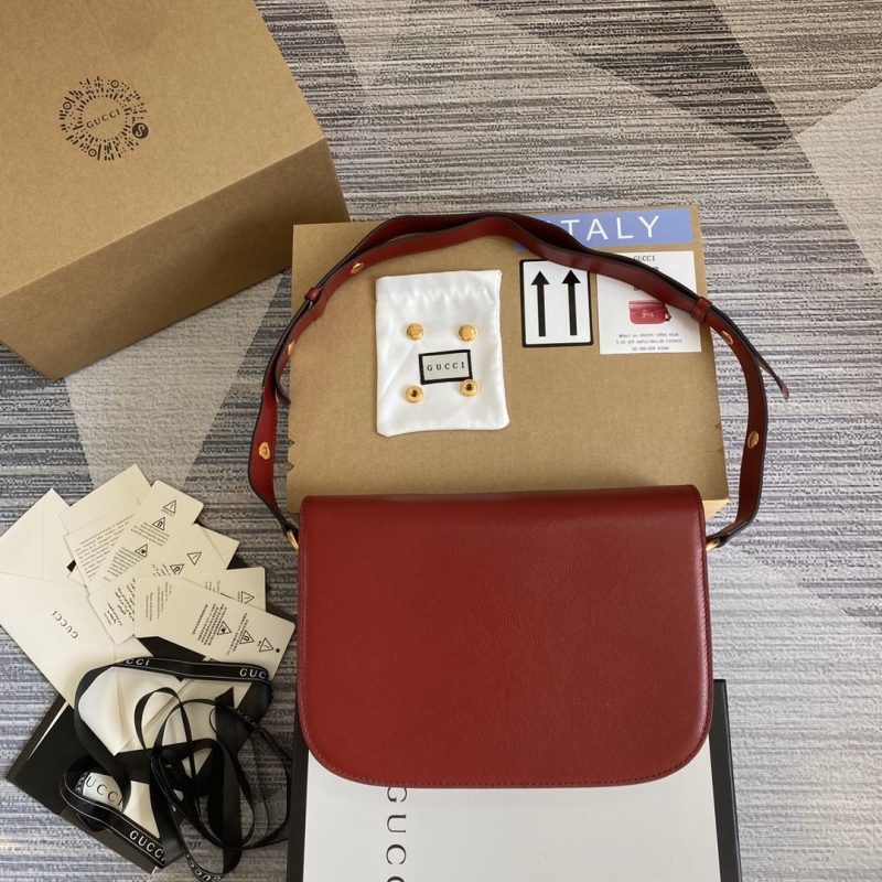 G*u*i top handle bags